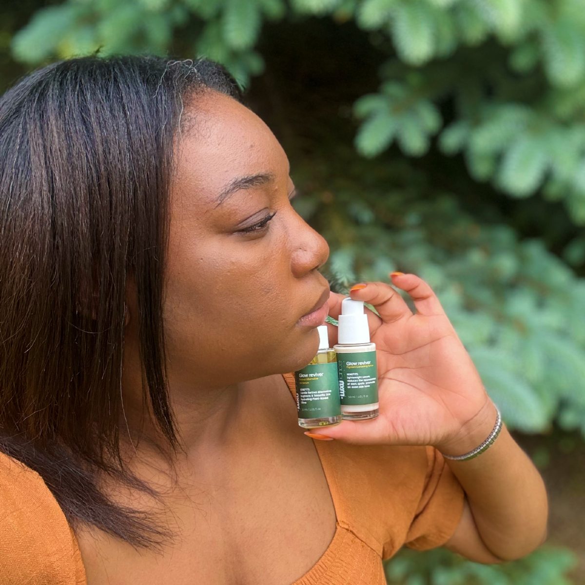 Customer with Pigment Correcting Serum and Retinol Alternative Oil Serum